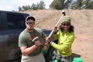 Wes Weisberg and Aisha Morris sledge hammers photo